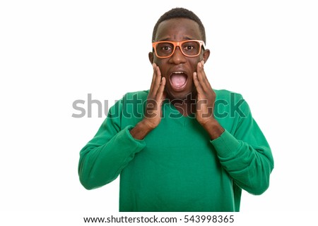 Young African man looking shocked isolated against white background