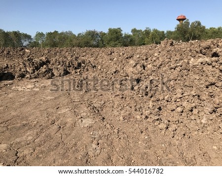 Construction site mounds of dirt and rock