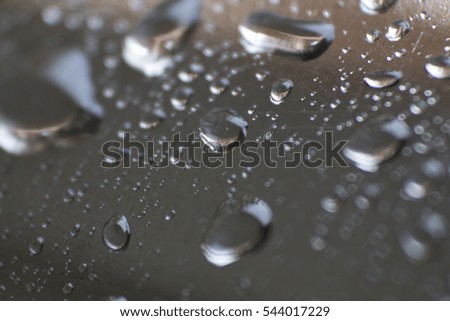 Raindrop in Rainy season, Water Drops On Black Background.