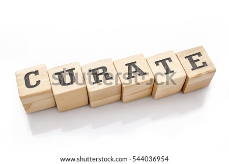CURATE word made with building blocks isolated on white