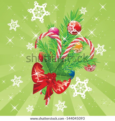 Tasty striped candy cane with red bow and Christmas tree branch.