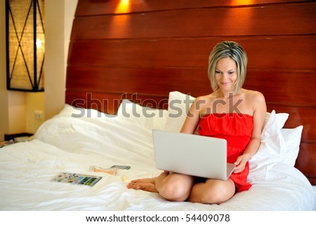 beautiful young woman using laptop