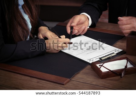 Notary with client in office