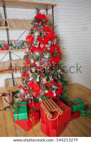 Christmas and New Year decorated interior with presents and New year tree
