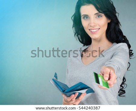 Woman gives credit card.