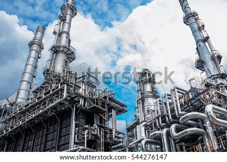 Close up Industrial view at oil refinery plant form industry zone with cloudy sky Royalty-Free Stock Photo #544276147