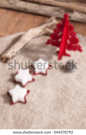 blurred decorated under a beautiful holiday decorated room with Christmas tree, interior design of colorful accessories