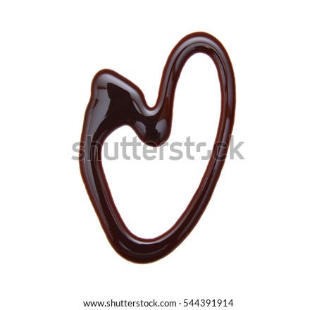 close up chocolate syrup heart shape on white background