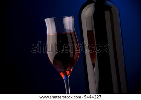 red wine glass and bottle details