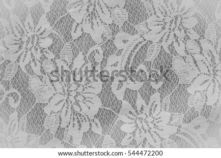 patterned openwork lace textile background or texture