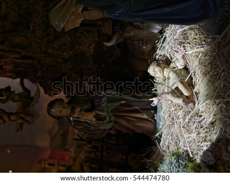 Christmas nativity scene represented with statuettes of Mary, Joseph and baby Jesus in Italy