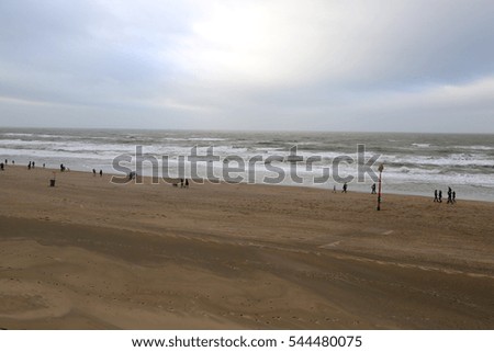 The North Sea coast with people in winter