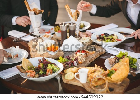 Business lunch, food testing Royalty-Free Stock Photo #544509922