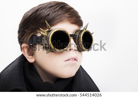 Portrait of a handsome boy closeup steampunk on white background 