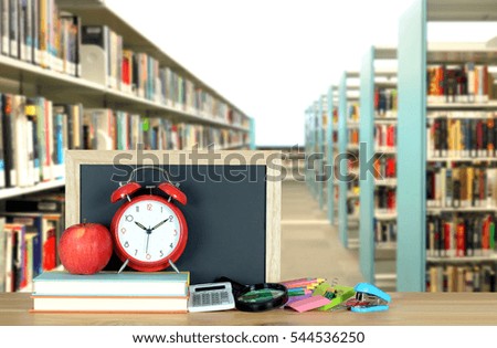 decorative book and library for education concept (very blurry background)