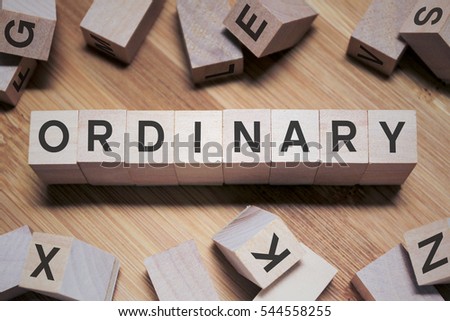 Ordinary Word Written In Wooden Cube