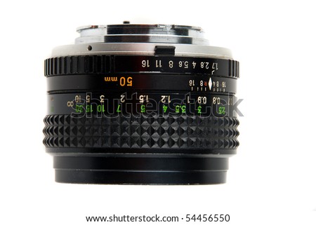 Old camera lens 50 mm isolated on white background