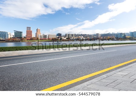cityscape and skyline of portland from empty road