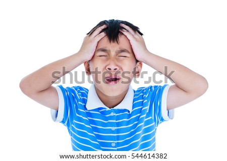 Closeup of asian child has a headache, his hand on temple, emotion feeling sign. Isolated on white background. Boy with a painful gesture. Negative human emotion, facial expression feeling reaction. Royalty-Free Stock Photo #544614382