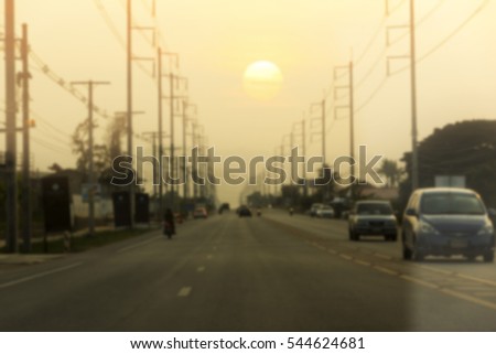 blurred of car on the road at evening and low key