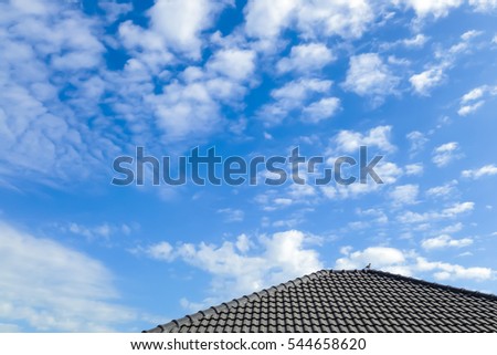 beautiful closeup clear blue sky and tiny cloud with silhouette of ceramic roof