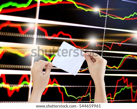 woman holding paper with graph