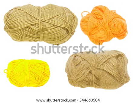 Colored balls of yarn. View from above. Rainbow colors. Yarn for knitting. White background. Isolated.