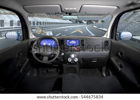 empty cockpit of vehicle, HUD(Head Up Display) and digital speedometer Royalty-Free Stock Photo #544675834