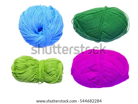 Colored balls of yarn. View from above. Rainbow colors. Yarn for knitting. White background. Isolated.