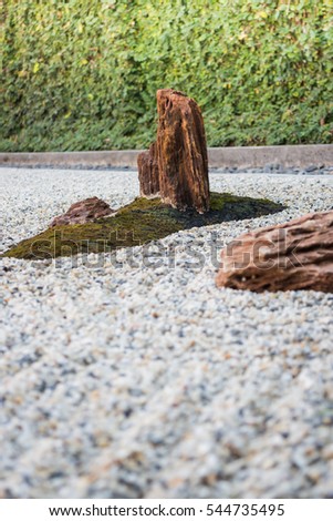 Zen gardens typically contain gravel and bare stones, stock photo