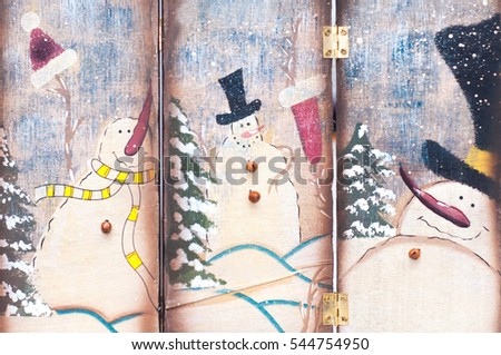 Christmas decorations in the form of screens with snowmen