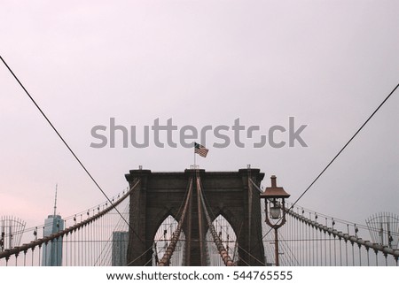 Brooklyn bridge with american flag, USA, New York