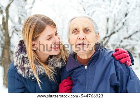 Picture of a young woman spending time with her grandmother