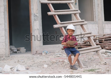 Engineer boy working control in construction site