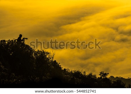 Male photographer on the mountain,Doi Luang Chiang Dao, Chiang Mai, Thailand