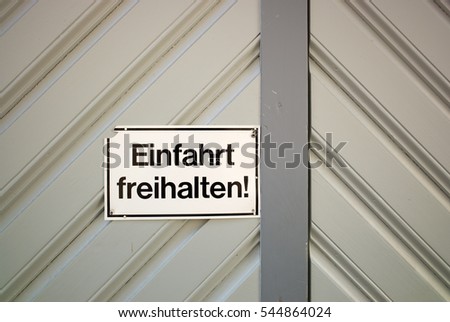 Keep clear sign on garage door, Wetzlar, Germany
Translation: Einfahrt freihalten = Keep entrance clear
