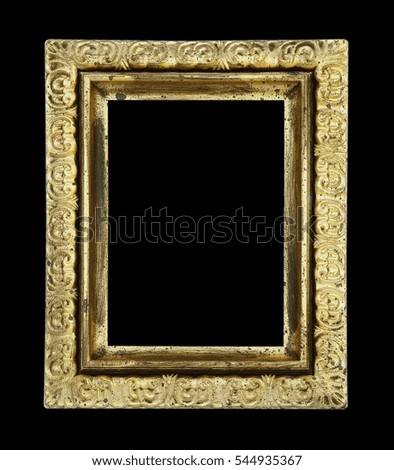 The old antique gold frame isolated on black background