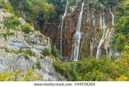 Waterfalls and lush green vegetation in Plitvice, Croatia, in summer