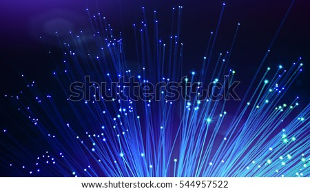 Optical fiber network cable on black background Royalty-Free Stock Photo #544957522