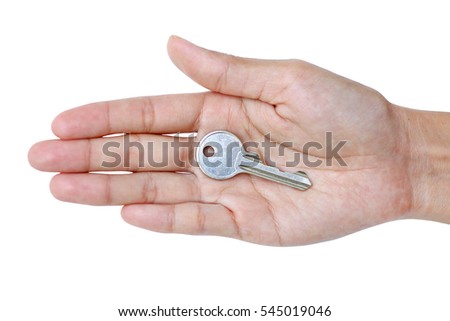 Closeup photo of hand holding keys isolated on white background