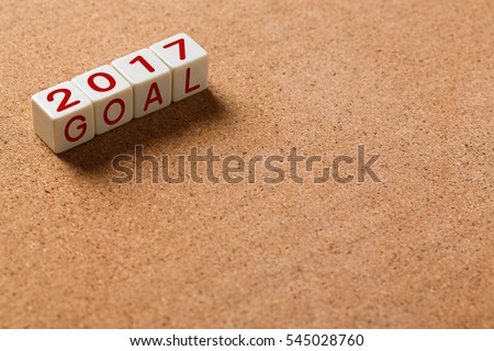 Close up 2017 numeric and goal letter on cork board, ready to fill message on empty space for advertising, business concept