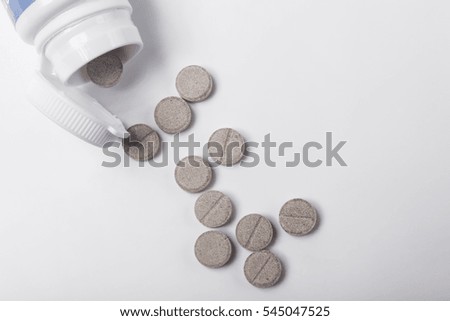 Pill bottle on a white background