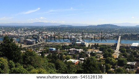 City of Portland - View of South Waterfront and East Portland as seen from Marquam Hill, west of the Willamette River. In view are Marquam Bridge, Tilikum Crossing, and Ross Island Bridge.