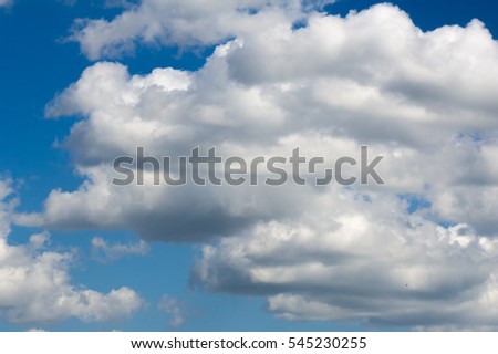 Texture, background. Clouds, sky photographed from a helicopter. a visible mass of condensed water vapor floating in the atmosphere, typically high above the ground.