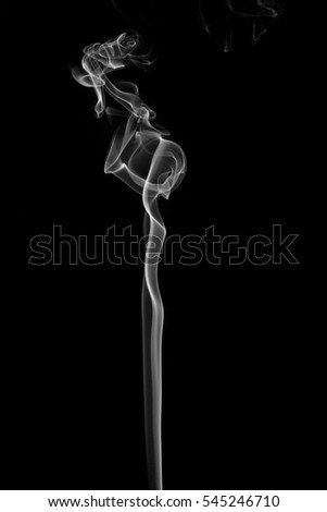 Abstract art. Gray smoke from the incense on a black background. Background for Halloween. Texture fog. Design element. The concept of aromatherapy.