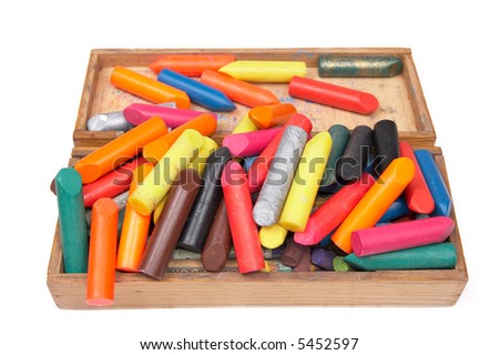 Crayons in box on white background