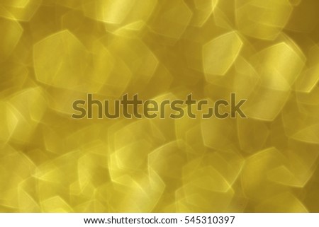 Shiny gold abstract background with a bokeh effect 