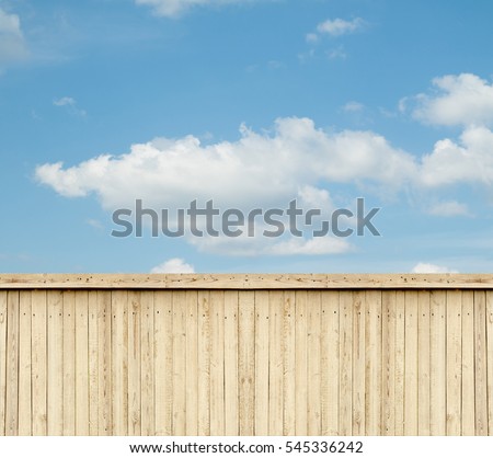 wooden fence sky clouds Royalty-Free Stock Photo #545336242