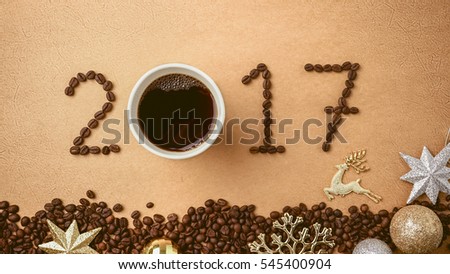 2017 coffee beans and christmas decorations in vintage style for new year concept