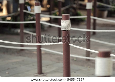 Rope on the pole for the shared corridor.